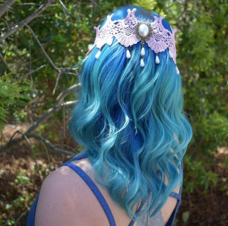 Ocean hair colour - loose wave son mid lrngth blue hair with bead accessory