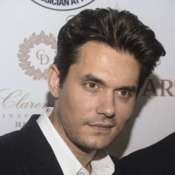 American singer John Mayer on the red carpet with his trademark brunette quiffed hair