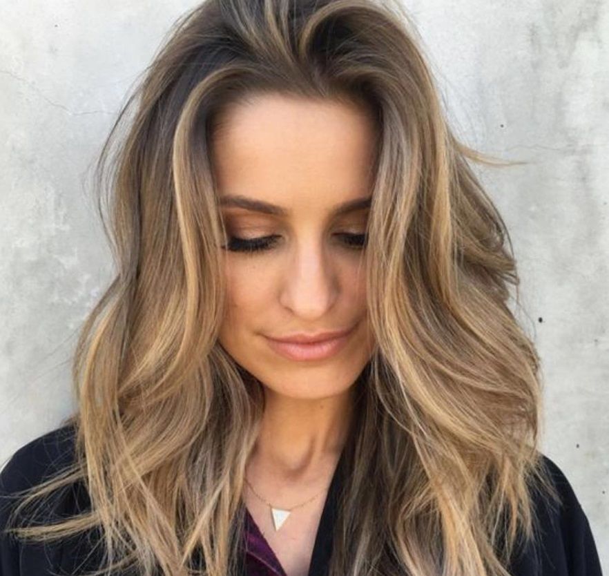 close up of woman with cinnamon hair colour