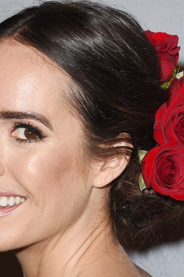 louise roe with roses in her hair