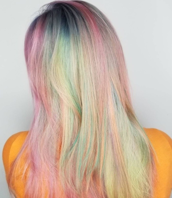 back shot of woman with lucky charm cereal inspired hair colour