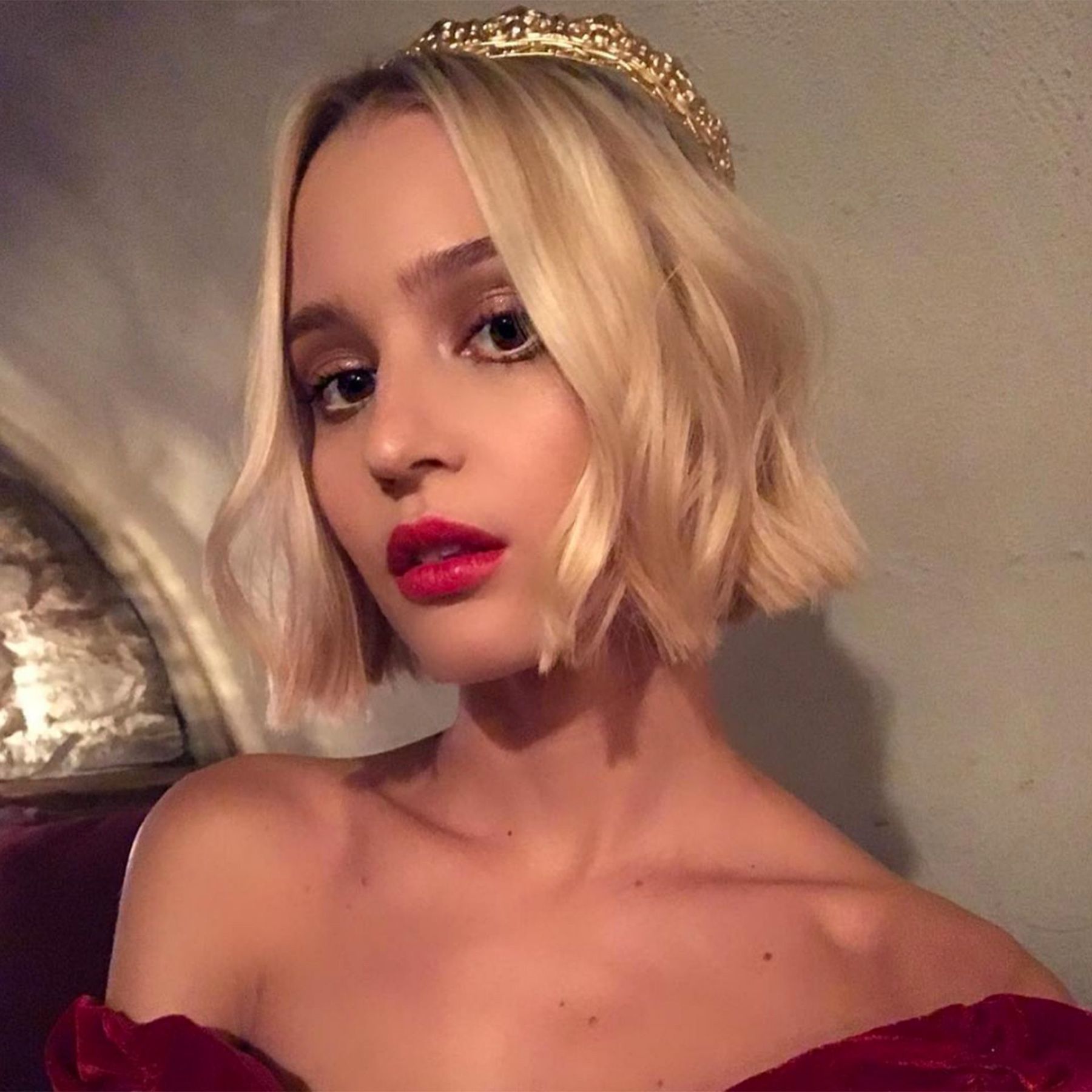 Metal hair accessories- golden crown accessory on bob length blonde hair