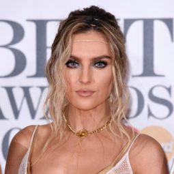 little mix singer perrie edwards on the red carpet wearing a grecian inspired hairstyle
