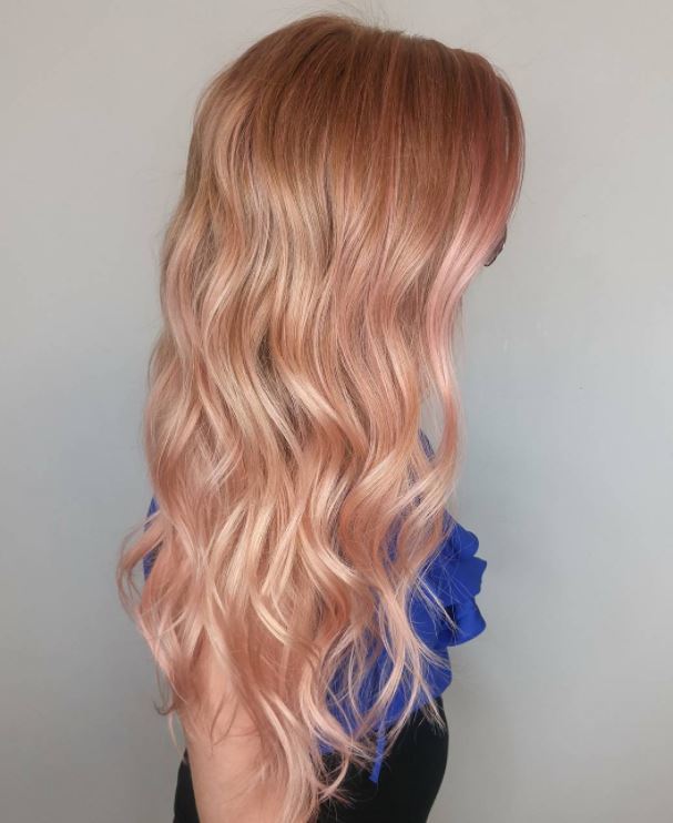 Pastel hair colours - long rose gold wavy hair