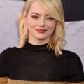 actress emma stone with shoulder length blonde hair and sweeping side bangs
