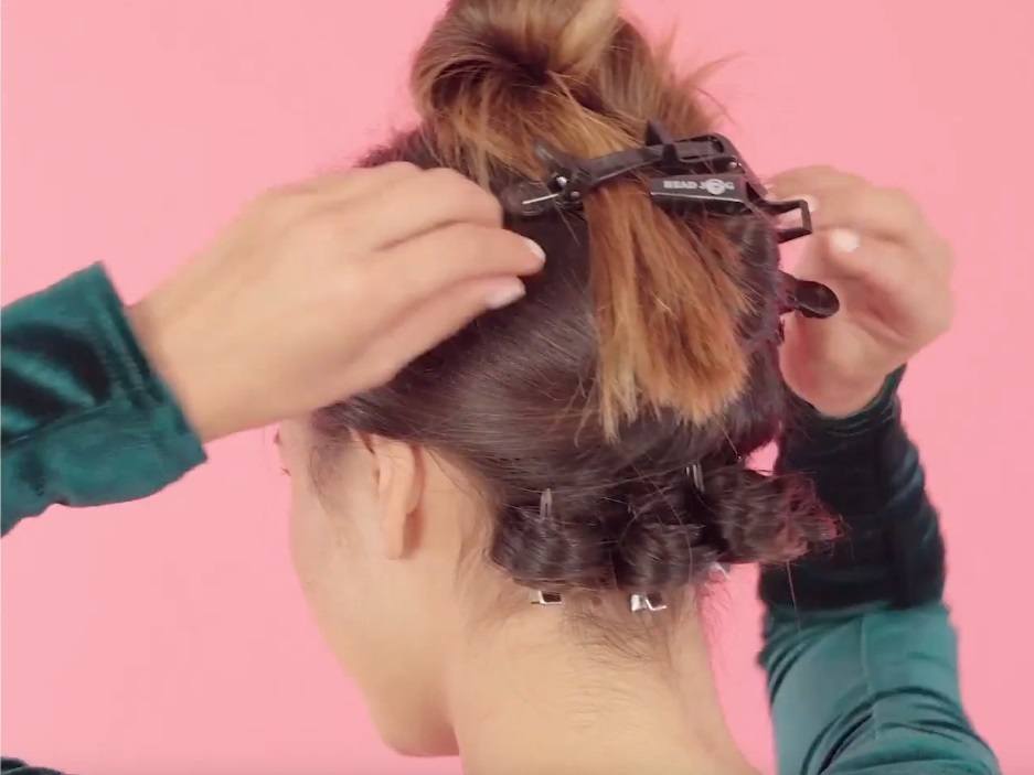 back shot of model with pin curled hair