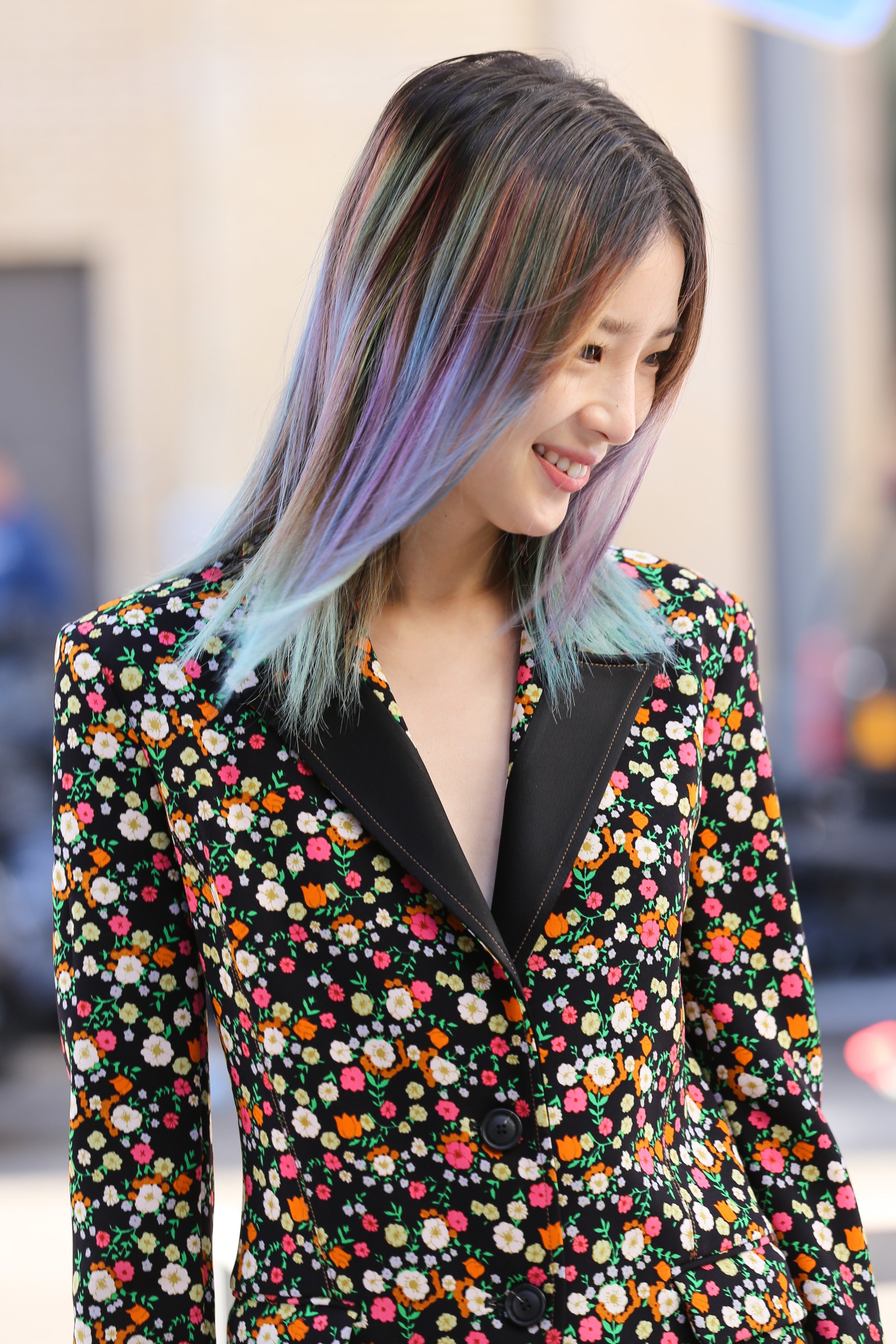 side shot of irene kim with rain dark brown ombre hair