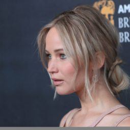 shot of Jennifer Lawrence on the red carpet with low bun hairstyle 2016