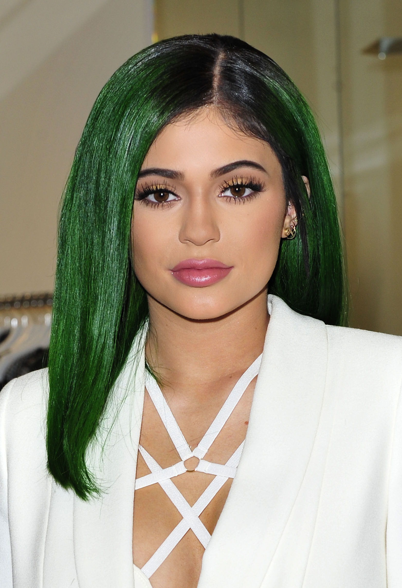 kylie jenner with emerald green dark brown ombre hair on the red carpet
