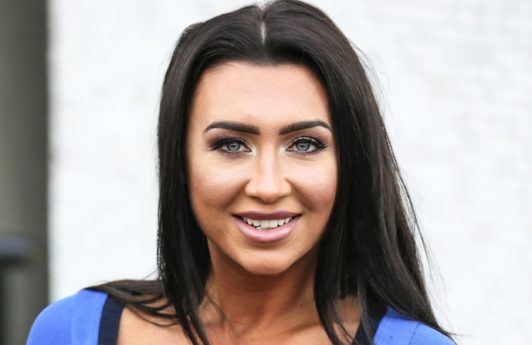 front shot of lauren goodger with brown hair posing picture