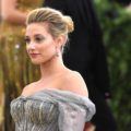 prom updos: Riverdale star Lili Reinhart at the met gala with her blonde hair in a coiffed updo