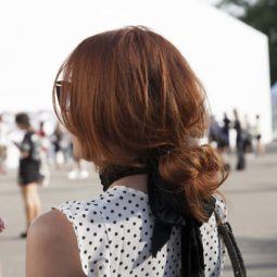 blogger bun: picture of street style model with blogger bun hairstyle