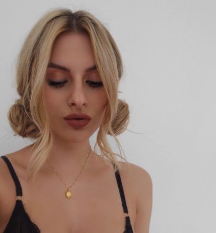blogger fashion influx with macaroon bun hair