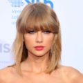 singer taylor swift with short shoulder length hair and bangs