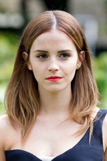 Emma Watson smooth blowout on mid length auburn hair
