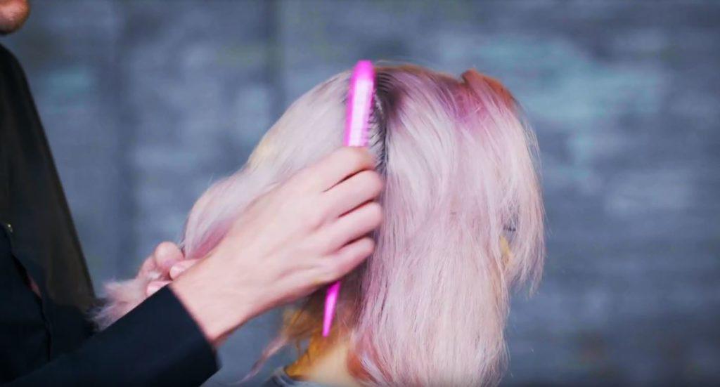 Superdrug Loves cartoon kid Halloween hair tutorial side view of hair being sectioned