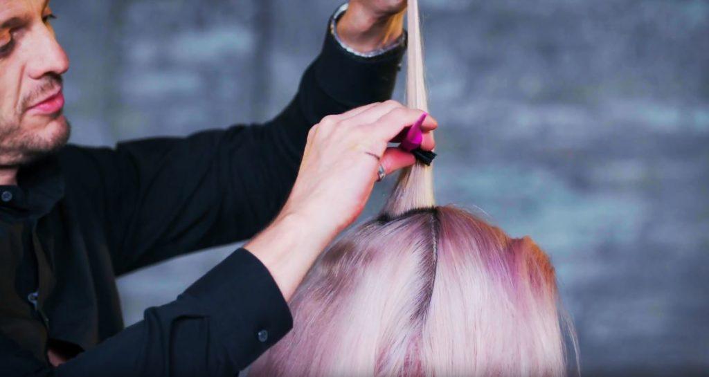 Superdrug Loves cartoon kid Halloween hair tutorial side view of hair being back brushed