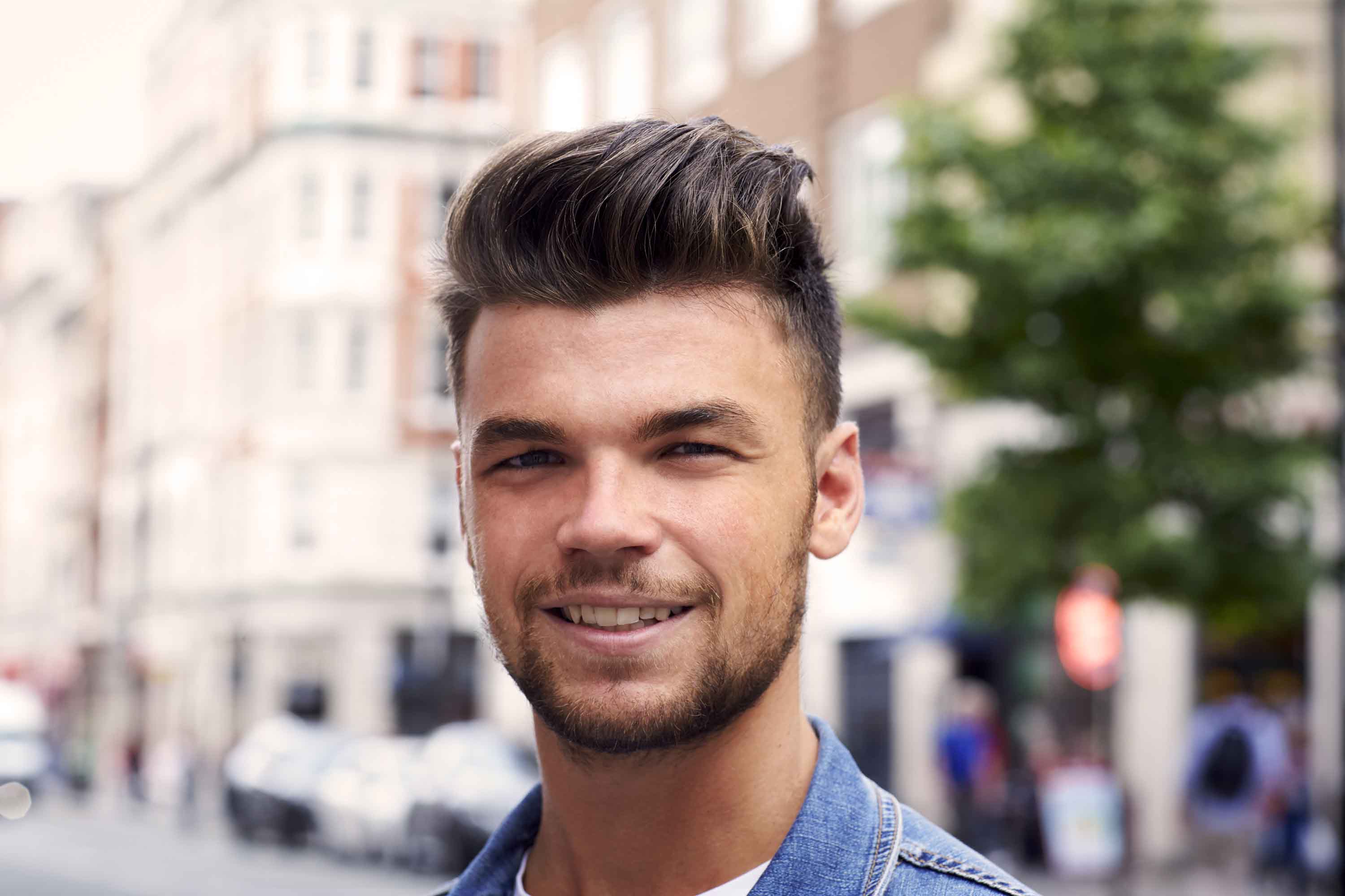 brunette streetstyle model with a quiff hairstyle