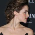 Emma Watson brown hair in braided updo shown from side angle
