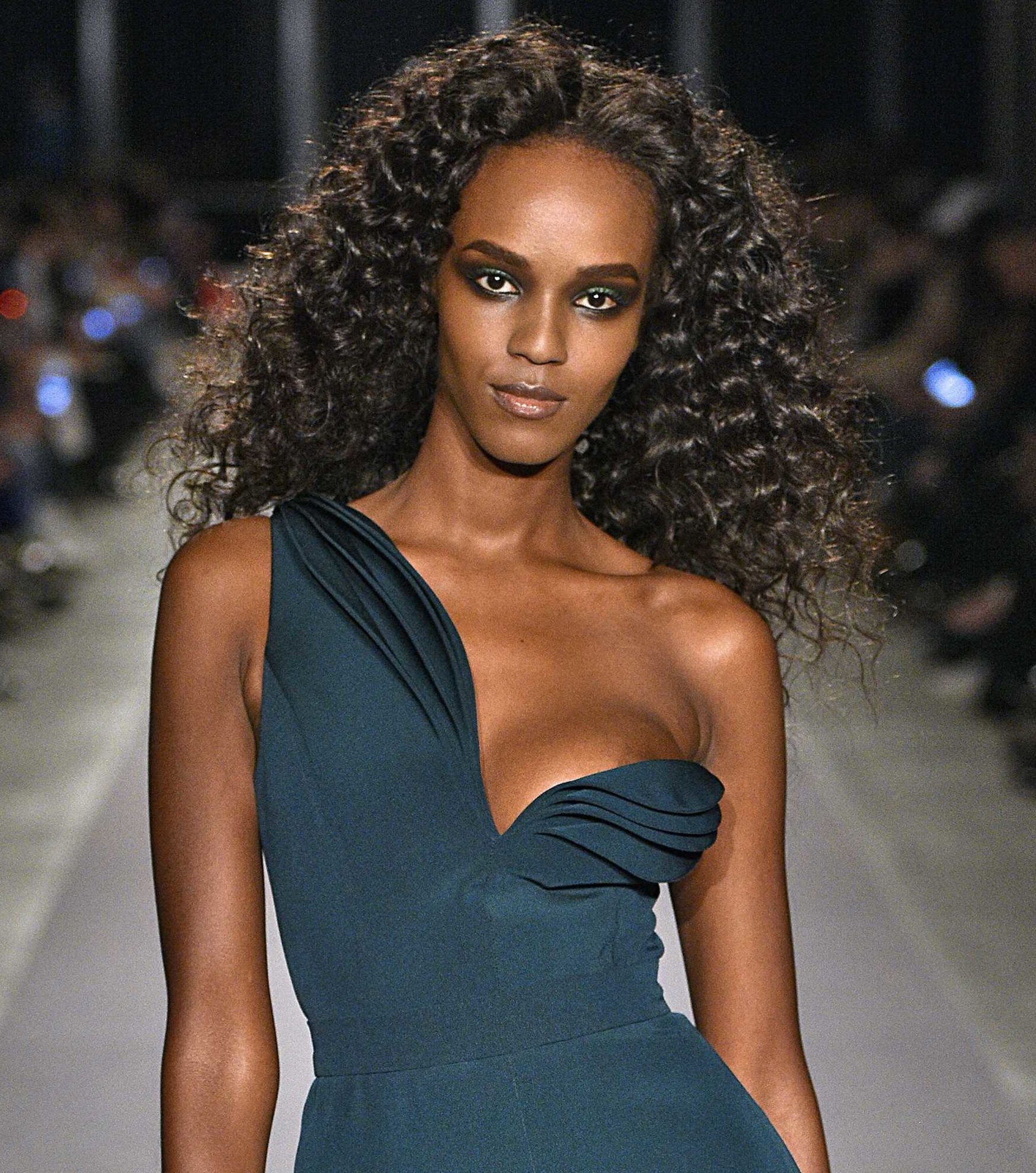 black runway model with flat twist out curly hair