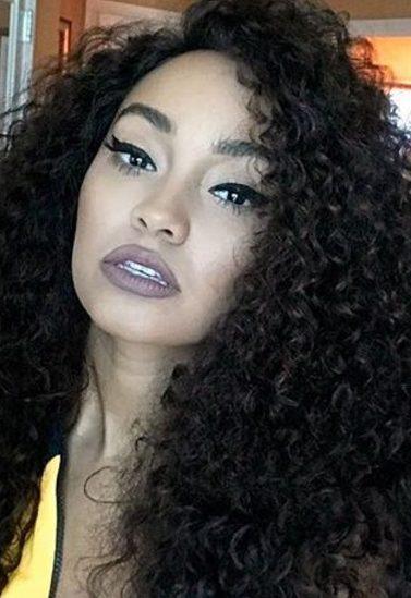 close up of leigh anne pinnock with big wild curls
