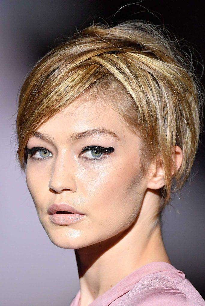 Gigi Hadid with blonde pixie on runway NYFW
