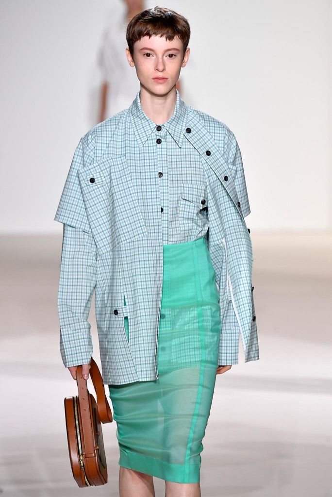 model on NYFW runway with brown hair short pixie cut