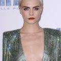 permanent silver hair dye: close up shot of cara delevingne on the valerian red carpet with silver grey hair