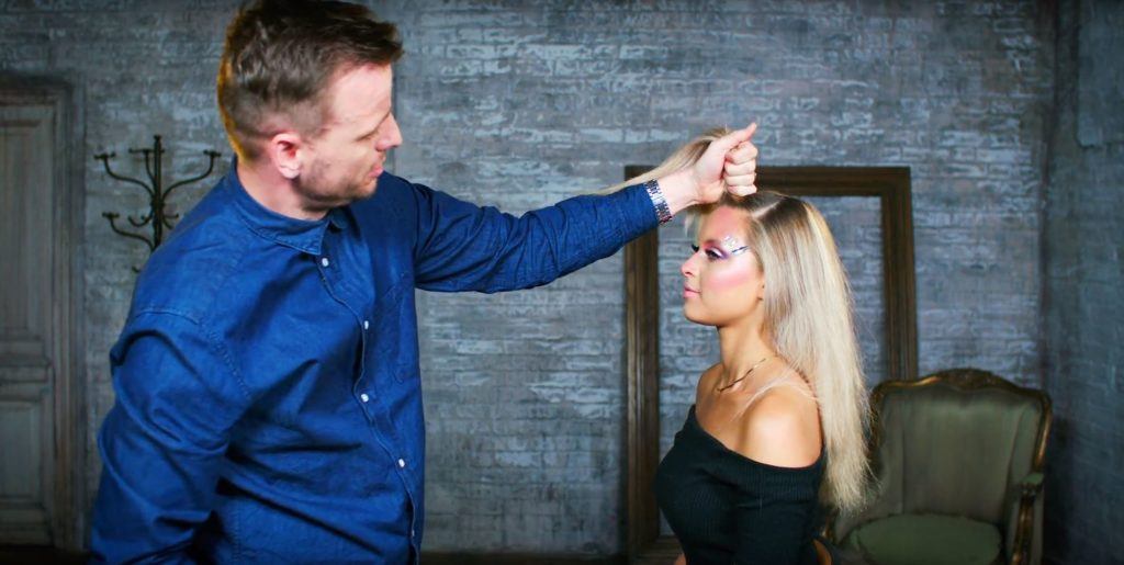 Unicorn Halloween tutorial: Stylist Dan Lynes gathering hair for a unicorn halloween hairstyle