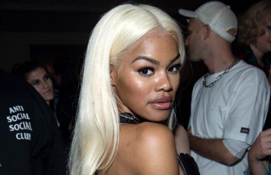 teyana taylor with blonde wig at the pat mcgrath labs event posing for shot