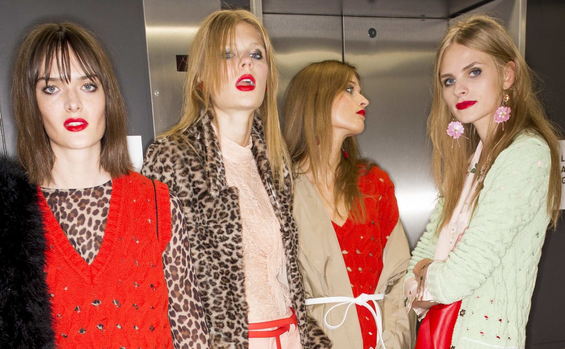 four models backstage at runway show with straight hair Topshop Unique