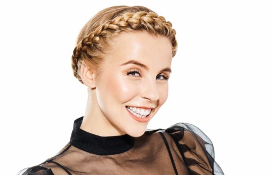 Chessie King with a party-ready halo braid