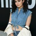 Charli XCX wear her black hair in curly style for Moschino event worn with denim outfit