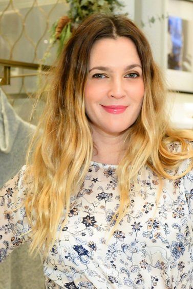 drew barrymore with brunette and blonde wavy ombre hair