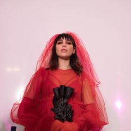 singer Dua Lipa dressed as winoda ryder's character beetlejuice