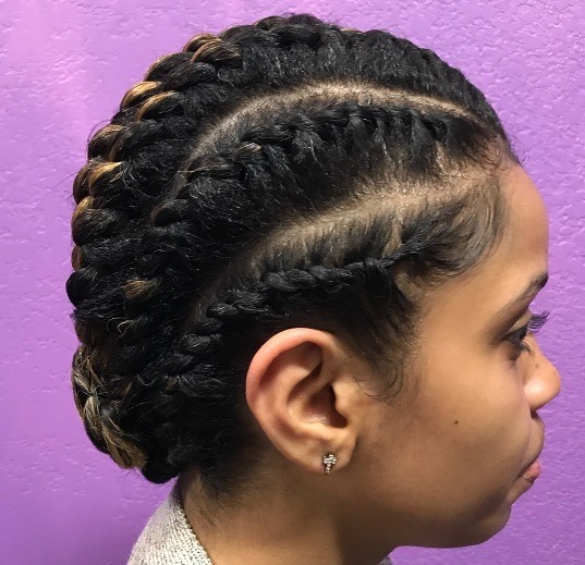 side profile of a woman with 2 strand twist set hair