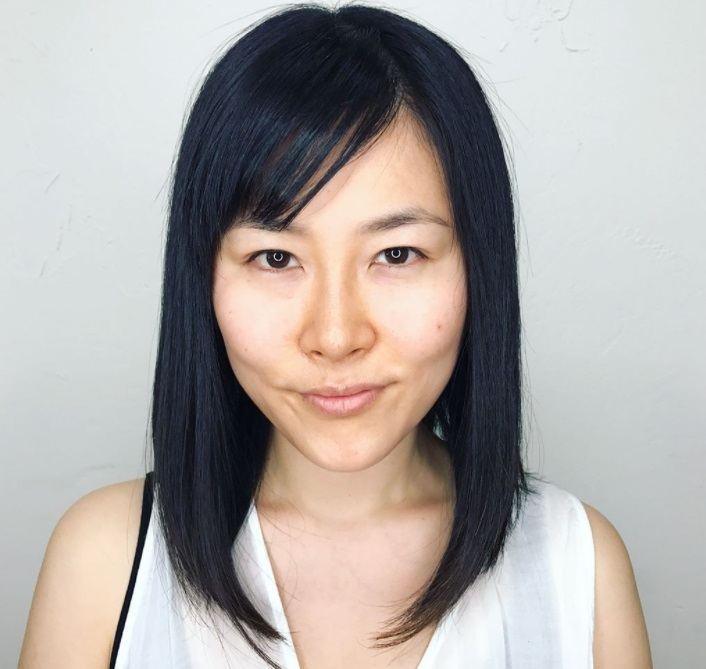 a line with bangs: close up shot of