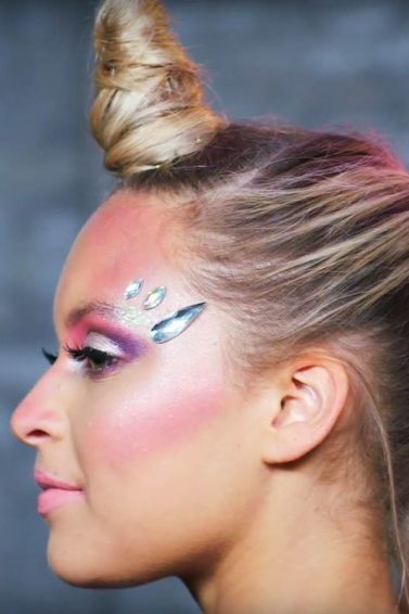 Unicorn Halloween tutorial: Side view of a unicorn halloween hairstyle on blonde hair