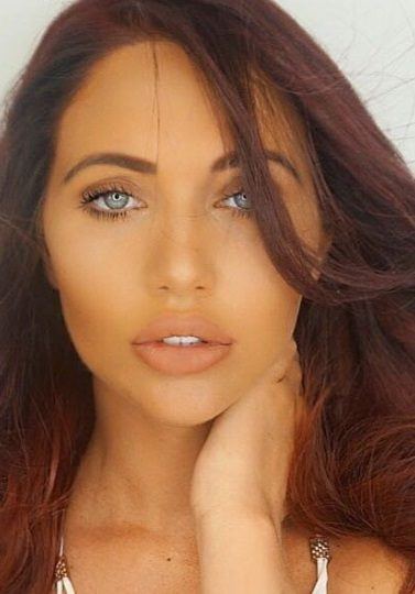 close up shot of amy childs with red hair posing on instagram