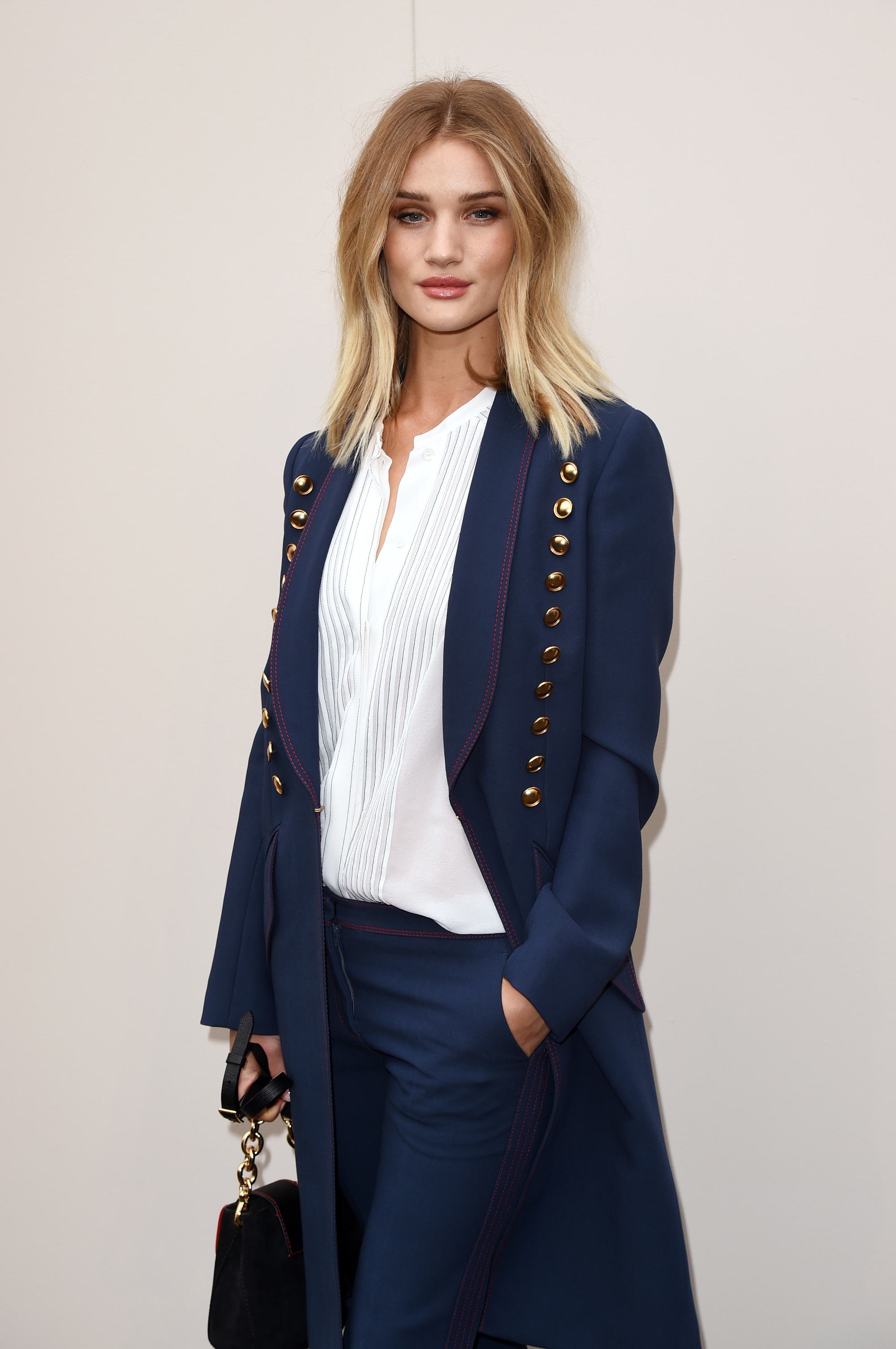 front view of rosie huntington-whiteley with blonde balayage lob