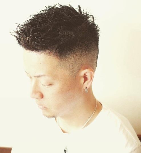 brunette asian man with soft spiked up hair