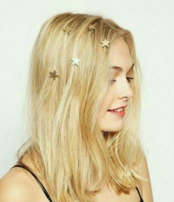 blonde woman with stars sprinkled in her roots