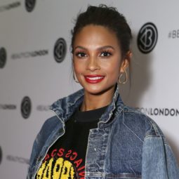 close up shot of alesha dixon with slick back hair, wearing black and denim on the beautycon london festival red carpet
