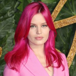 The Fashion Awards 2018: Georgia May Jagger with bright pink dyed hair, wearing a pink blazer suit