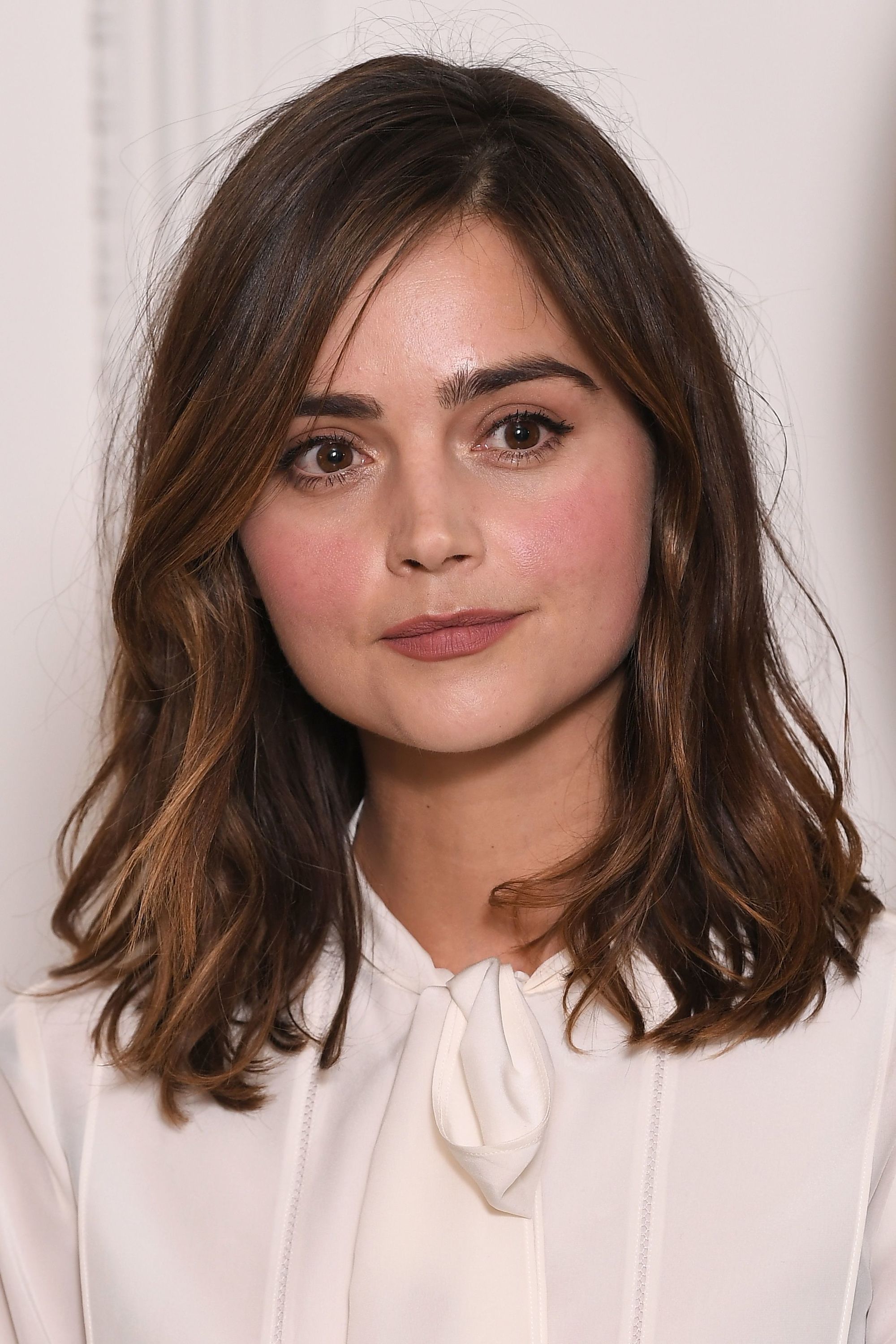 front view of Jenna Coleman with long bob and natural waves