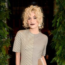 british pop singer pixie lott with blonde curly hair styled in an updo