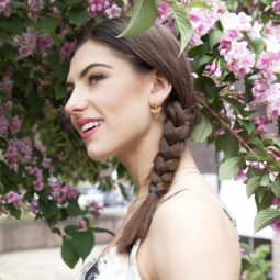 Side view of brunette model with side braid