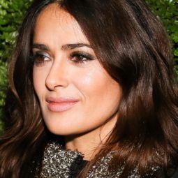 close up shot of Salma Hayek with brown wavy hair, on the red carpet