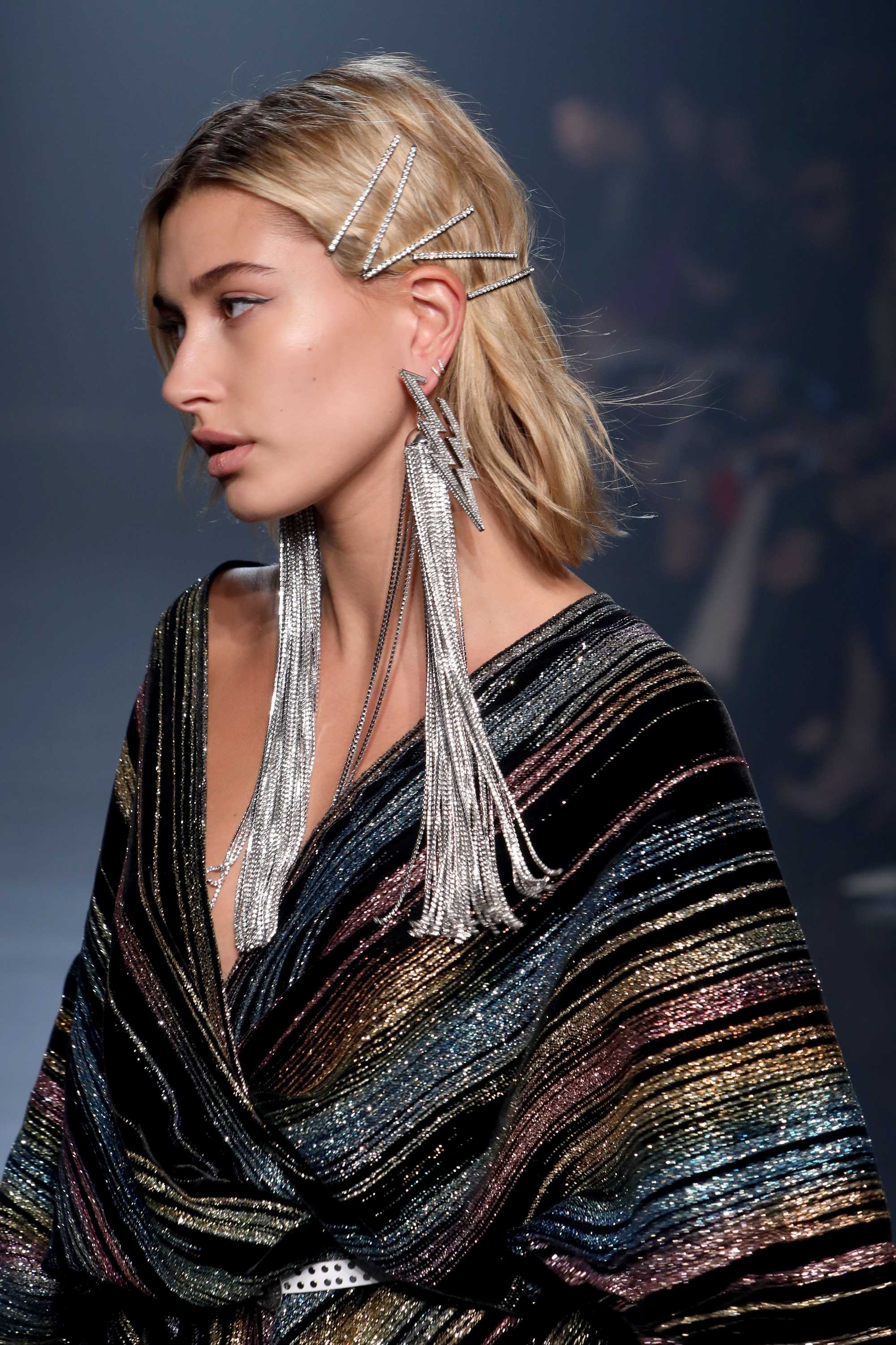 hailey baldwin blonde shoulder length hair with jewelled hair slides on catwalk