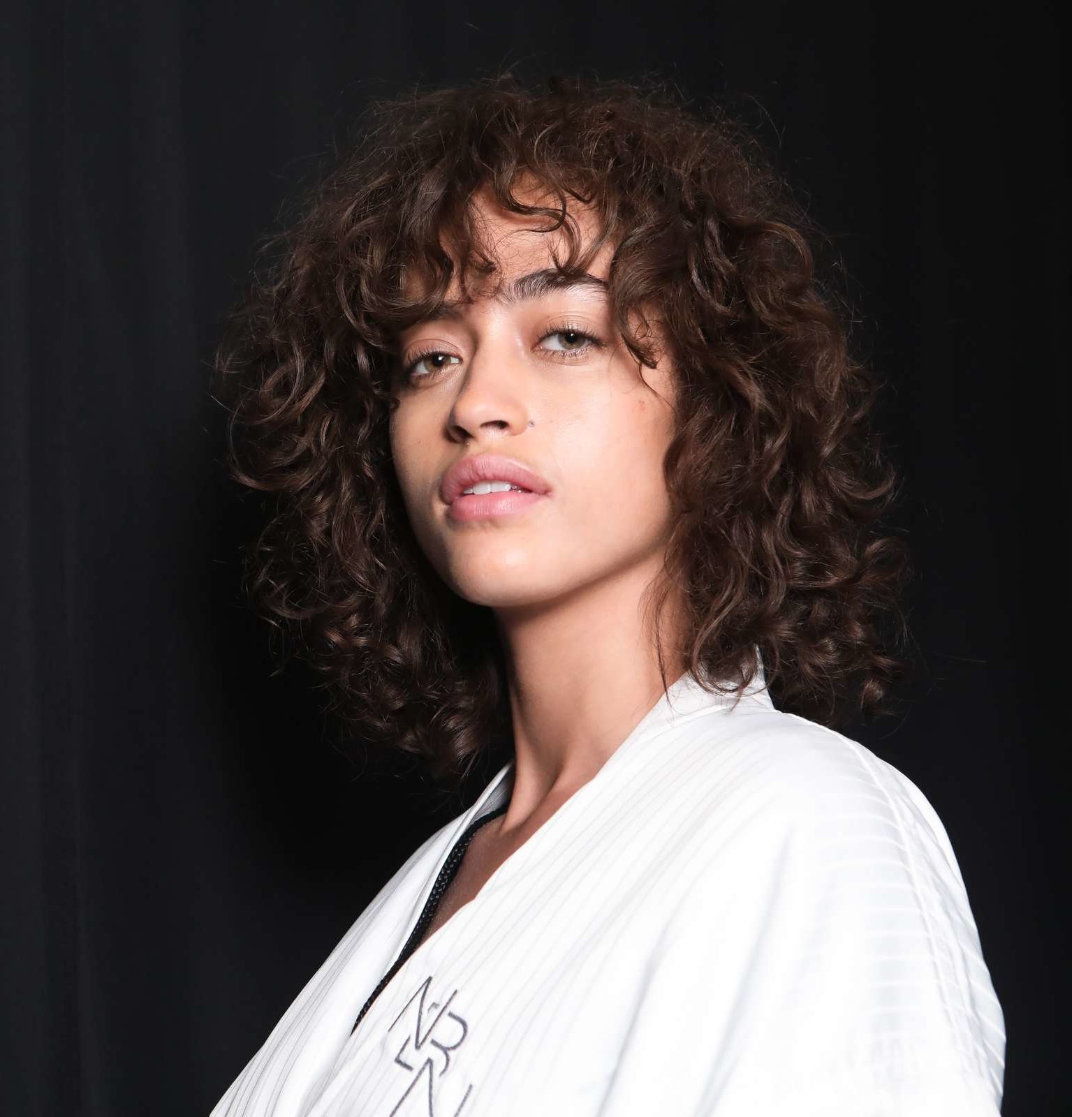 alanna arrington curly brown hair with fringe